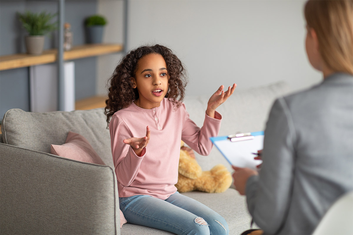 child in aba therapy practicing social skills for kids with autism