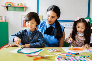 therapist and children work on aba adaptive skills