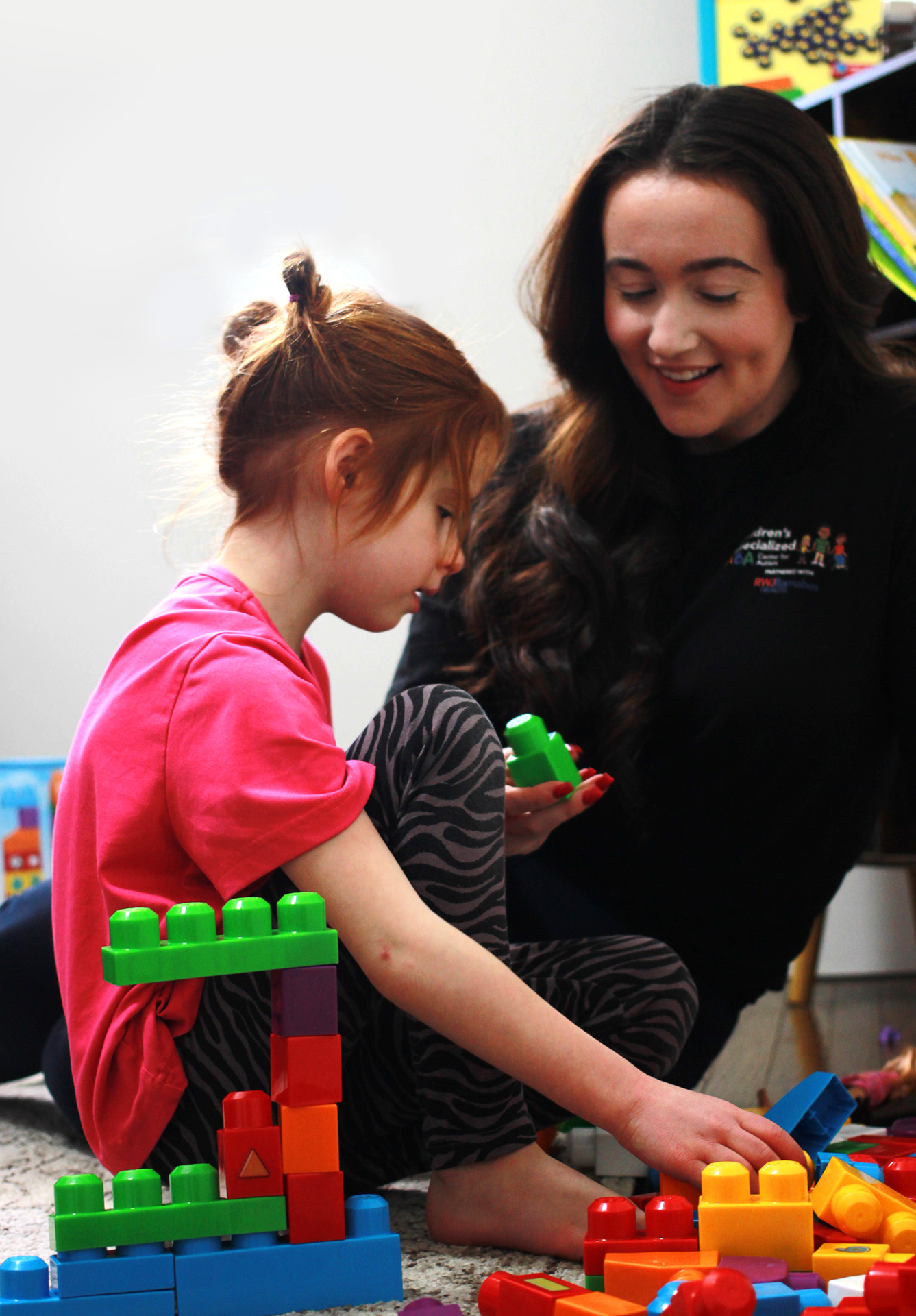 Krystal working with child